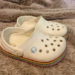 6T White crocs with rainbow stripes